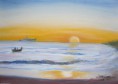 Paisagem marítima com barcos ao por do sol